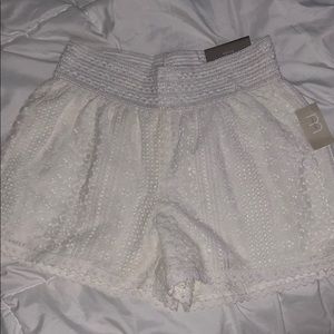 White lace shorts
